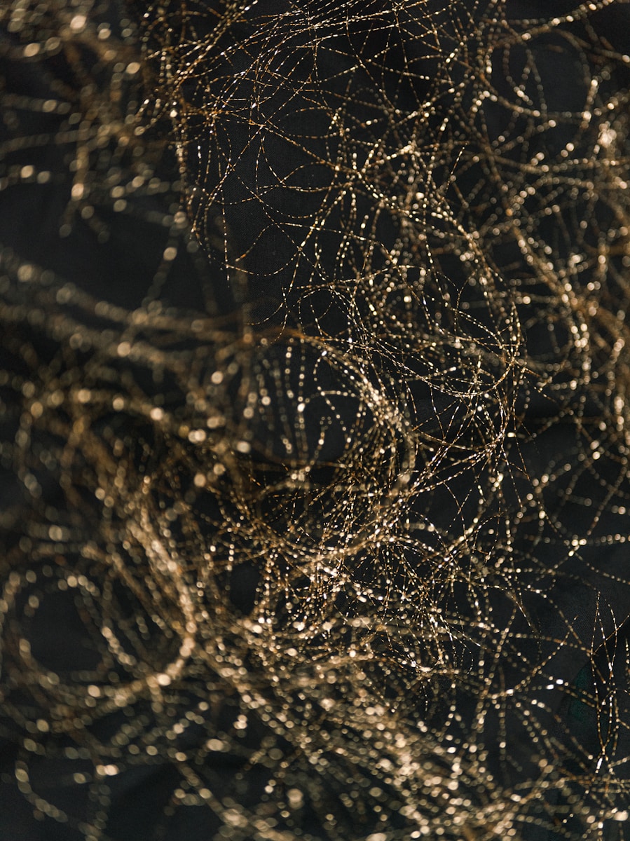 a close up of a cell phone with a bunch of wires on it